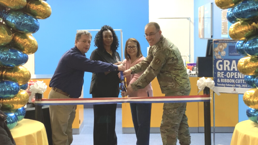 <b>From left: General Manager Charles Eaves, Services & Business Manager Kimberly Woodard, Store Manager Beth Koontz and 72nd Mission Support Group Deputy Commander Lt. Col. Ronnie Synakowski cut the ribbon on the relocated and upgraded cleaners and alterations shop.</b>