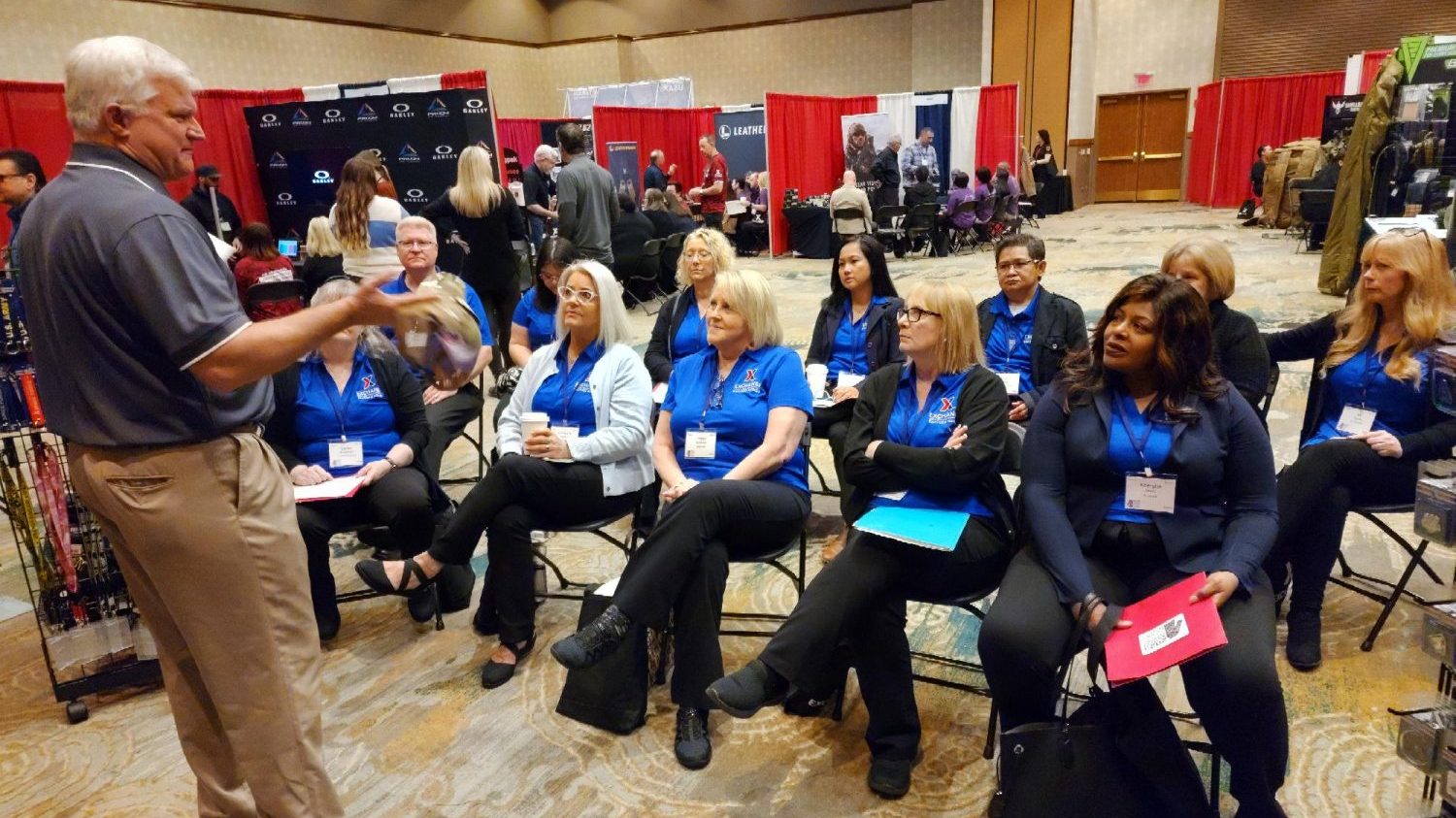 <b>Military Clothing store managers listen to a presentation during the Vendor Expo at the Military Clothing Conference. The conference ran March 6-10 in Frisco, Texas.