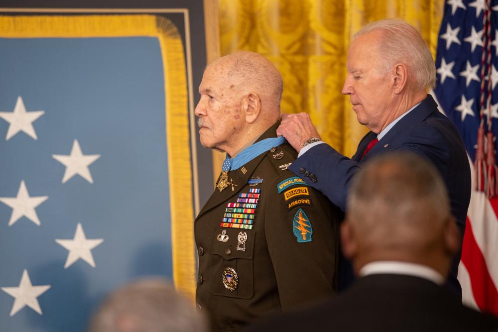 President Joseph Biden bestows the Medal of Honor to retired U.S. Army Col. Paris D. Davis during a ceremony at the White House on March 3. Col. Davis was awarded the Medal of Honor for acts of gallantry and intrepidity above and beyond the call of duty while serving as a detachment commander during combat operations in Vietnam. (U.S. Army photo by Bernardo Fuller)