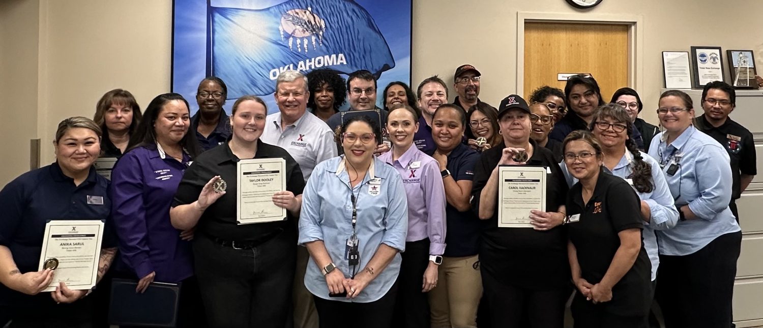 <b>Exchange Director/CEO Tom Shull with members of the Tinker AFB Exchange team.</b>