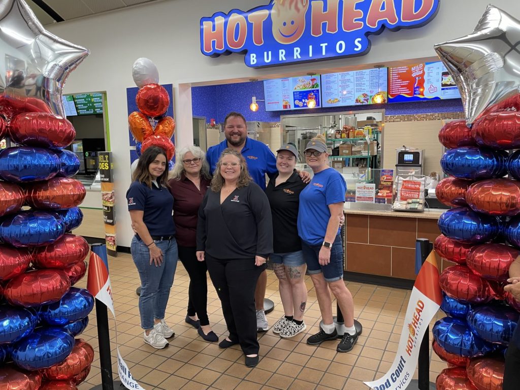 <b>From left, Left to Right, Exchange Visual Merchandiser Kelley Hall, Services Operator Tracy Clark, Hot Head Burritos Owner Zachery Ketring, Hot Head Burritos Manager Cheyenne Roberts, Hot Head Asst. Manager Donna Erickson and Center Service Business Manager Melissa Allen.</b>