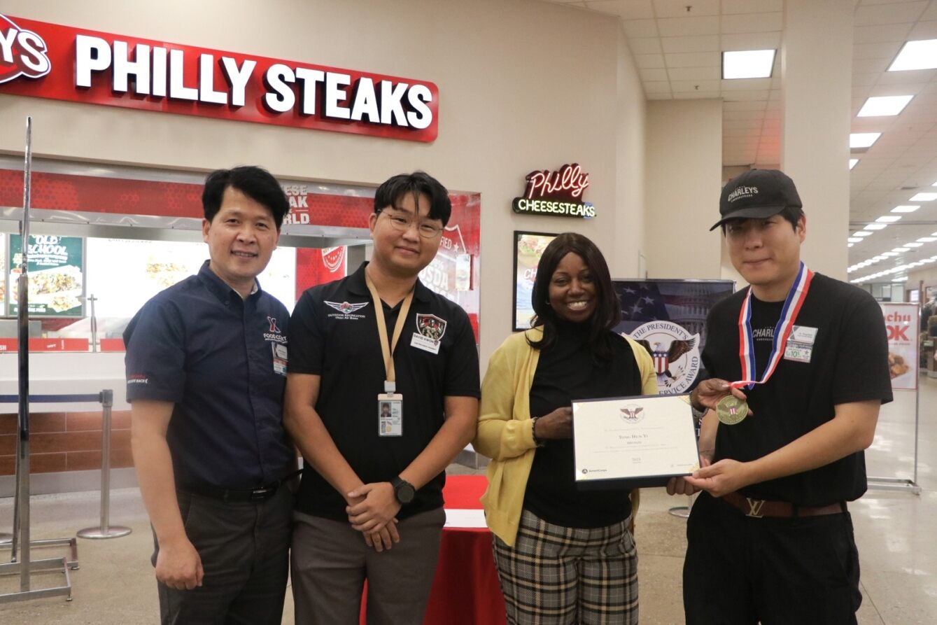 >b>Osan Food Court Manager Song, Song-in, 51st FSS Outdoor Recreation Lead Specialist David Kwon, Camp Humphreys and Osan AB General Manager Vanessa Rowland and Yi, Tong-hun posts for a picture after Yi was awarded Presidential Volunteer Service Award signed by the 46th U.S. President, Joe Biden and a Bronze Medal for his volunteerism. After one year of volunteering, Yi completed more than 100 hours of behind-the-scenes coordination and support which ensured Airmen could enjoy their outdoor activities and resulted in him receiving the PVSA. (Courtesy Photo by Humphreys Exchange)</b>
