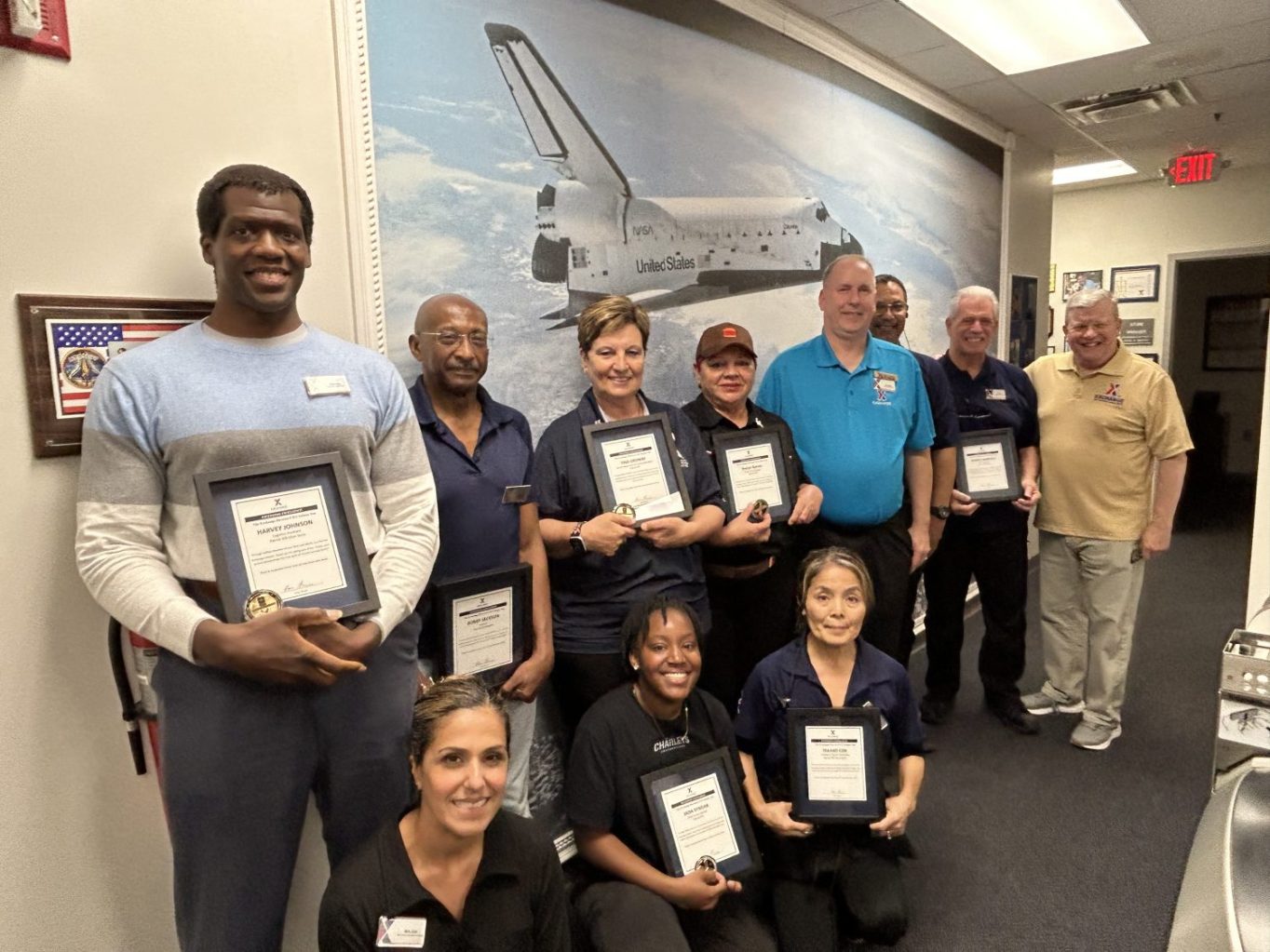 <b>Exchange Director/CEO Tom Shull, right, with the Patrick Space Force Base Exchange Team. Standing, from left: 