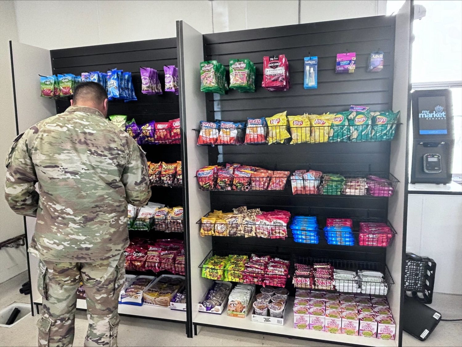 Service member shopping at Camp San Luis Obispo unattended retail unit