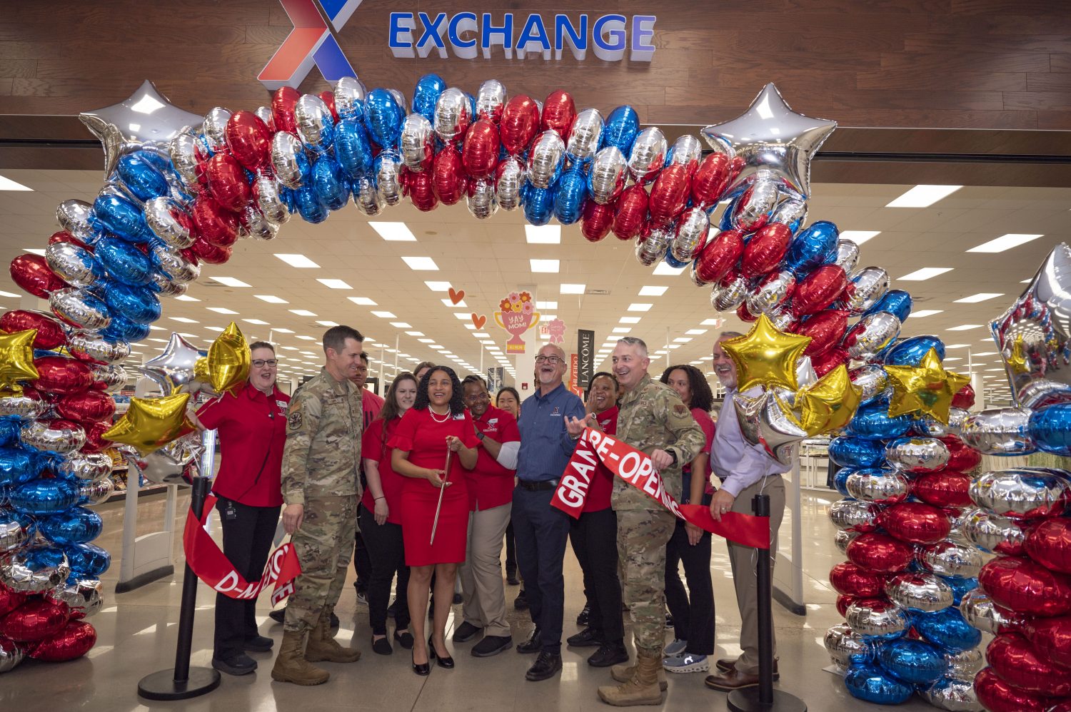 Front row, from left: Davis-Monthan Exchange Sales & Merchandise Manager Mary Ann Brooks; Col. Scott Mills, 355th Wing commander; Davis-Monthan General Manager Hafeeza McCullough;Ronny Rexrode, Exchange Western Region senior vice president; Col. Casey Bartholomew, 355th Mission Support Group commander; and Ronny Rexrode, Exchange Western Region senior vice president.