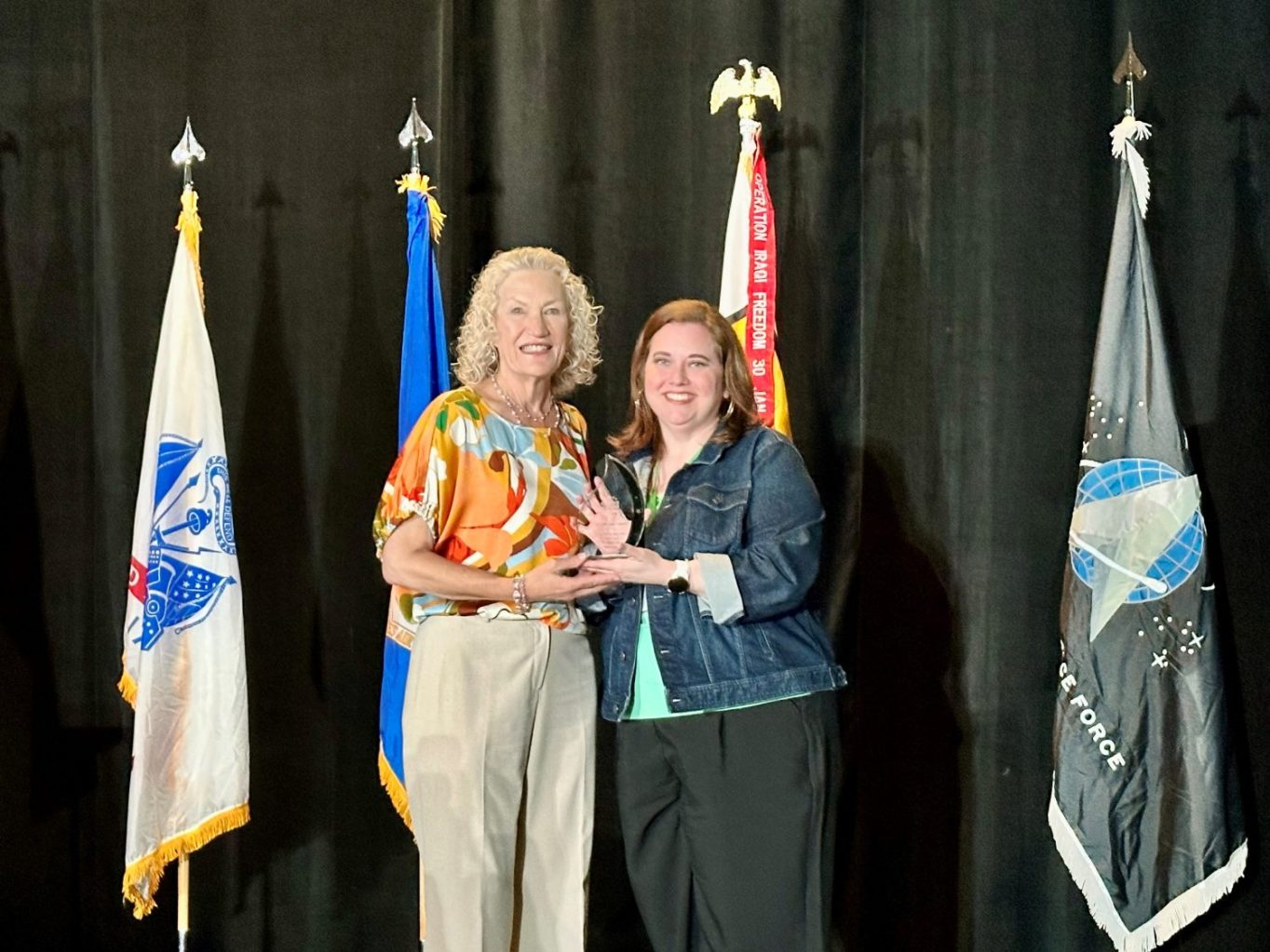 <b>Pacific Region Vice President Jennifer Jordan, right, accepts the region Rock Your Sales Award on behalf of the Rodriguez Range from Vice President of Consumables Martha Robuck at the 2024 Express Semianr.