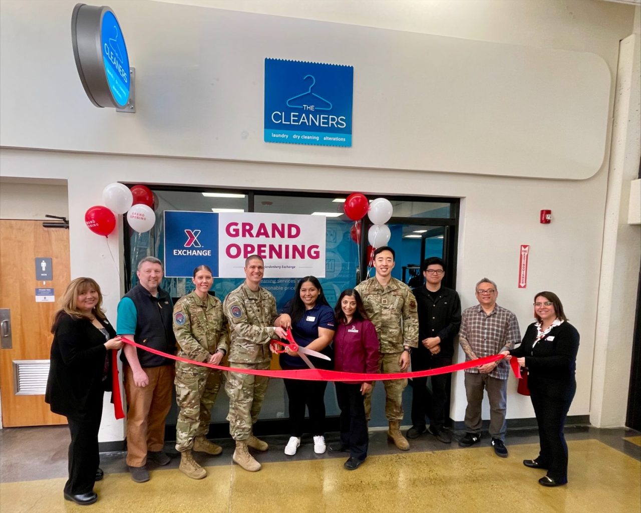 <b>From left: Grace Sanchez, human resources technician; Mr. Justin Picchi, Tech School director; Master Sgt. Nichole DiBenedetto, first sergeant; Lt. Col. Jonathan Arehart, 533rd Training Squadron commander; Maribel Ceja, services business manager; Urvi Acharya, general manager; (fourth from right is a 2nd Lt. customer, name unknown); Isaac Cerna, Cleaners employee; Juhn Catallo, Cleaners manager; Sammantha Daniels-Pitrelli, recruiting manager</b>