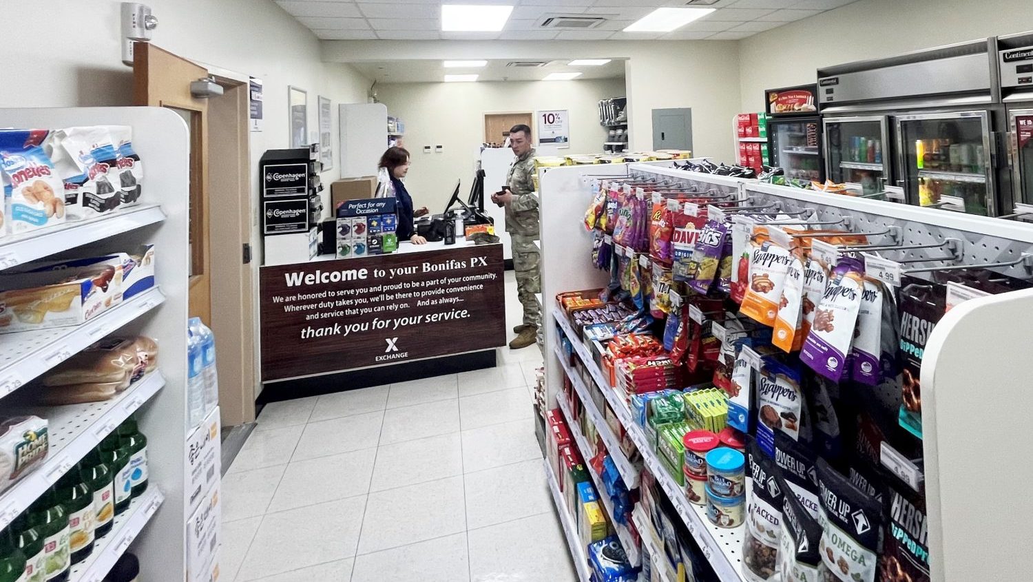 <b>A Soldier shops inside Camp Bonifas' new Post Exchange. The upgraded PX more than doubles the size of a previous store.</b>