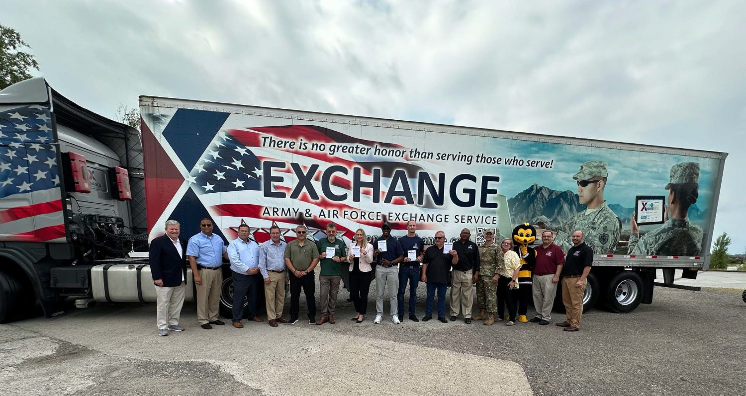 Pictured, from left: Mr. Shull; Jonah Thomas, Fleet Operations manager; Brian Guest, Europe Region fleet supervisor; Executive Vice President/Chief Logistics Officer Alan French; Germersheim Distribution Center Manager Charlie Rios; Assistant GEDC Manager Joerg Mueller; Alexandra Gottfried, supervisor, Customer Service Operations; Eugene Baker, supervisor logistics associate; Kennet Saareleht, supervisory warehouse associate; Udo Valentin, vehicle mechanics foreman; Roger Wright; Logistics operations manager; Chief Master Sgt. Rich Martinez, Exchange senior enlisted advisor; Logistics Vice President Morgan Meeks; the Exchange Safety Bee; Jason Taylor, Loss Prevention manager; and Dirk Burns, operations analyst.

