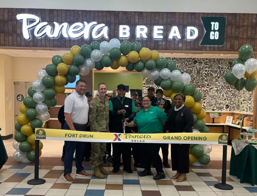 Exchange, Fort Drum and Panera leaders cut the ribbon on Fort Drum's new Panera Bread location.