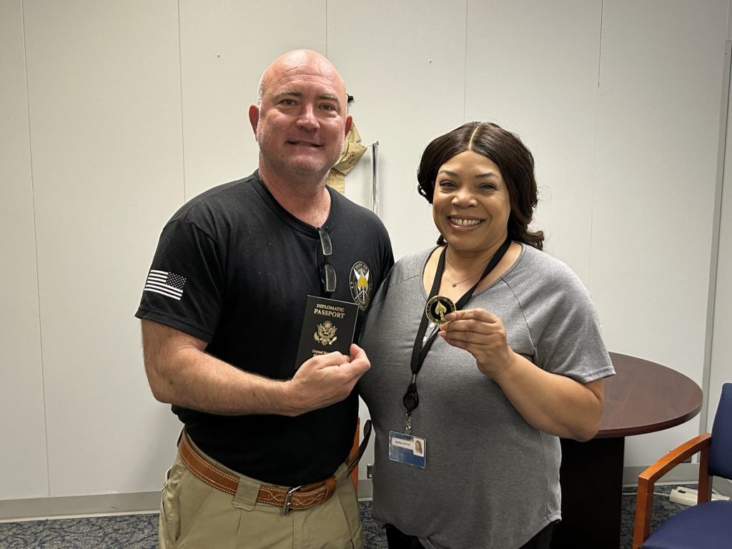 Col. David J. Green with the Exchange relocation manager Norris Watkins.