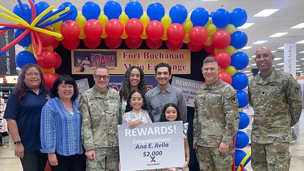 <b>From left: Fort Buchanan Exchange Assistant Store  Manager Gisela Rivera; General Manager Rochelle Tolentino, Garrison Commander Col. Charles Moulton, mother Johannie Santiago, father Eduardo Avila, winner Ana Avila, sister Emma Avila, Command Sgt. Major. Sgt. Maj. Roderick Hendricks, Deputy Garrison Commander Lt. Col. Sean Cook.</b>