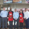 Photo of Exchange and Hunt Brothers Pizza leaders at Hunt Brothers Pizza at the Sagamihara Housing Area Express on Camp Zama.