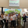 Exchange leaders, JB Andrews leaders and celebrity chef Robert Irvine cut the ribbon on Fresh Kitchen at the JB Andrews Exchange.