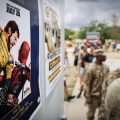 Troops in Romani line up for a screening of "Deadpool & Wolverine"