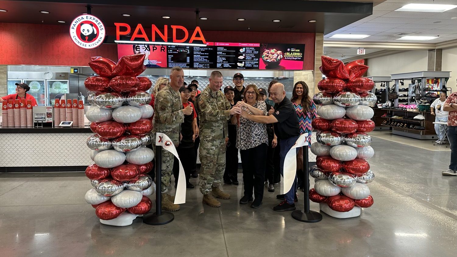 Exchange and installation leaders cut the ribbon on the new Panda Express at MacDill AFB.