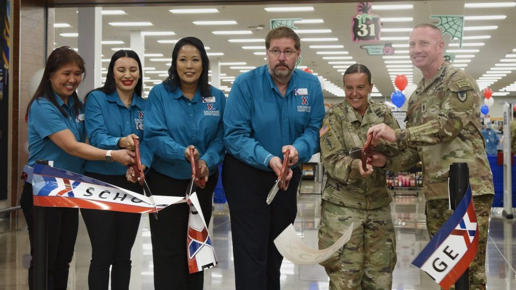 Exchange and Schofield Barracks leaders cut the ribbon at the Schofield Barracks Exchange grand reopening.