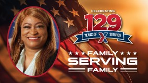 Head shot of Lorraine Brown with "129 Years of Family Serving Family" text.